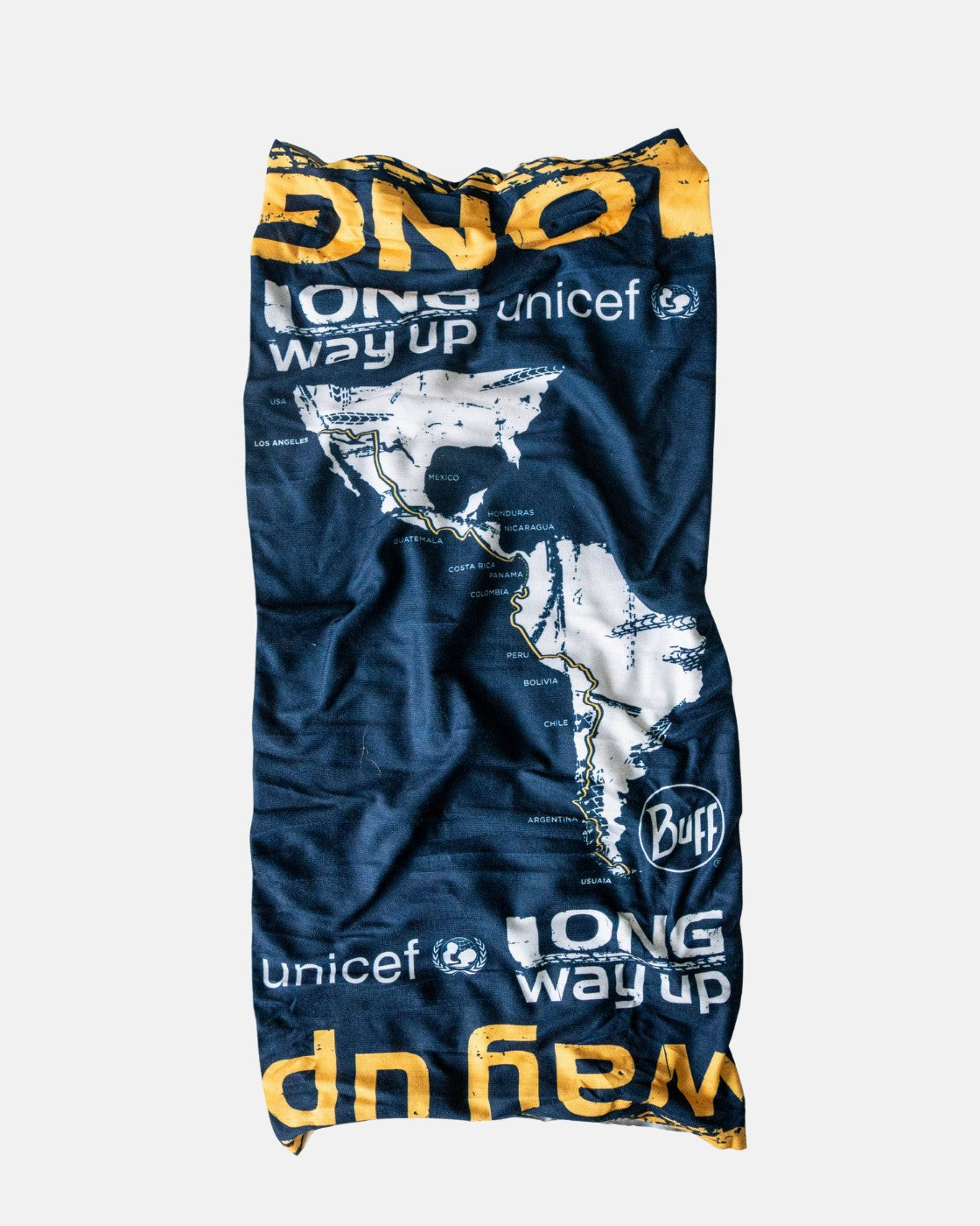 The Long Way Up Neck Buff by Long Way Shop is a dark blue gaiter with a map of North and South America, featuring UNICEF, LONG way UP, and Buff printed in white and yellow.