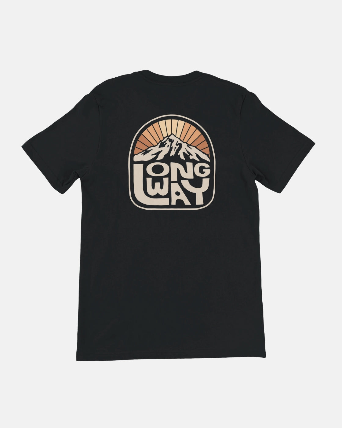 The Long Way Shop’s Long Way Sun Mountain Standard T-Shirt features a back graphic of a sunburst over a mountain with bold “LONG WAY” text, and is made from soft Airlume combed cotton for all-day comfort.