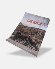 Long Way Up Poster by Long Way Shop shows two men beside motorcycles on a rural road with hills, with Ewan McGregor and Charley Boorman’s names displayed at the top. A3 size.