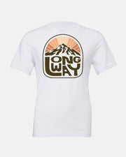 The Long Way Sun Mountain V-Neck T-shirt from Long Way Shop features a back graphic with a mountain, rising sun, and LONG WAY text. Made from premium cotton, it offers a lightweight and breathable feel.