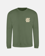 The Long Way Shop’s Long Way Bike Green Sweatshirt features an olive green crewneck with a subtle graphic and “LONG WAY” printed on the upper left chest—ideal for cycling or everyday style.