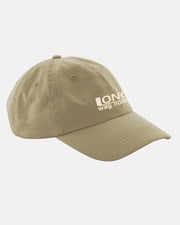 The Sand Dad Cap by Long Way Shop features LONG way home in white on the front left panel, shown against a plain light gray background.